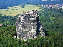 Falkenstein, in Saxon Switzerland where routes above grade 6a (5.10a) were first climbed in 1906. Falkenstein in der Sachsischen Schweiz (Sachsen) Nationalpark.jpg