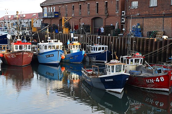 Fishing boats moored in Scarborough Harbour, North Yorkshire, England.