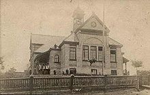 Flesherton Public School in 1903. Built in 1891, it was used as a schoolhouse until 1968, and was destroyed by fire in 2009. Flesherton Public School 1903.jpg