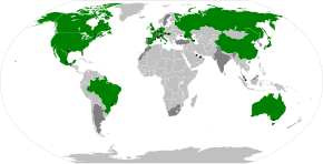 Nations that hosted a Grand Prix in 2019 are highlighted in green, with circuit locations marked with a black dot. Former host nations are shown in dark grey, and former host circuits are marked with a white dot. Formula 1 all over the world-2019.svg