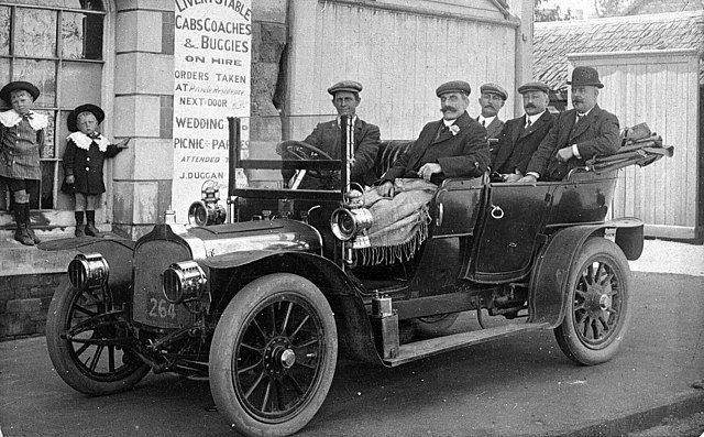 Adolphus Verey (c. 1911) Gentlemen's Motoring Party in a Talbot outside Duggan's Livery Stables, Castlemaine, Victoria