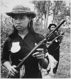 The local and regional militia forces were an important component of the pacification program to defeat the Viet Cong and provide security to villages. Girl volunteers of the People's Self-Defense Force of Kien Dien, a hamlet of Ben Cat district 50 kilometers north of Sai - NARA - 541865.tif