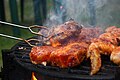 osmwiki:File:Grilled steaks turned by grill tongs near Hostákov, Vladislav, Třebíč District.jpg