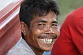 Grinning Laotian showing teeth.jpg