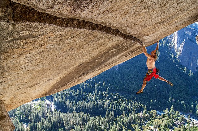 Heinz Zak [de] free soloing Separate Reality in 2005; Zak had taken the iconic photograph of Wolfgang Güllich making the first free solo of Separate R