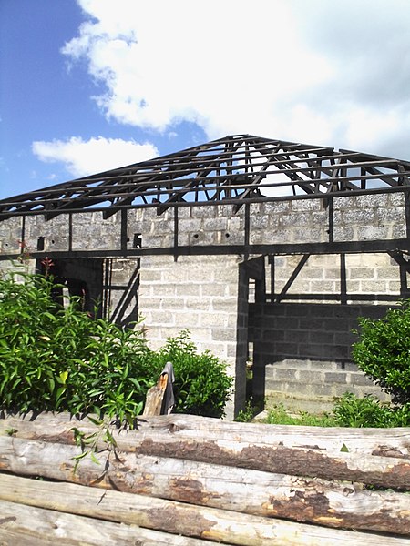 File:House under construction in Chipata Compound.jpg