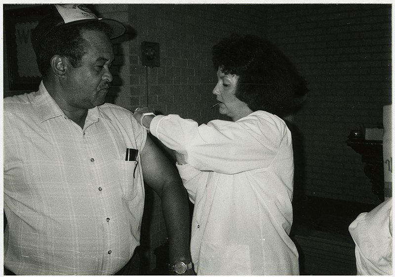 File:Immunization- Man getting vaccinated (16429641167).jpg