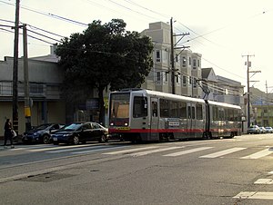 Inbound train at Taraval and 17th Avenue, September 2017.JPG