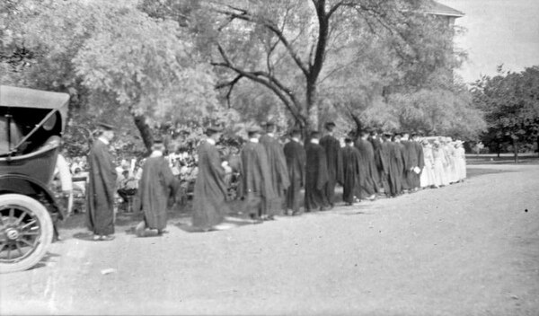 Line of young people at a commencement ceremony