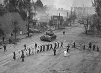 American M26 Pershing tanks in downtown Seoul during the Second Battle of Seoul. In the foreground, United Nations troops round up North Korean prisoners-of-war. M26 Pershing Seoul 1950.jpg