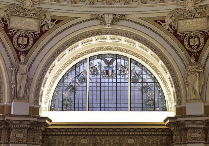 File:Main Reading Room. Semi-circular stained glass window in alcove by H.T. Schladermundt with statues of Poetry and Philosophy on either side. Library of Congress Thomas Jefferson Building, Washington, D LCCN2007684388.tif