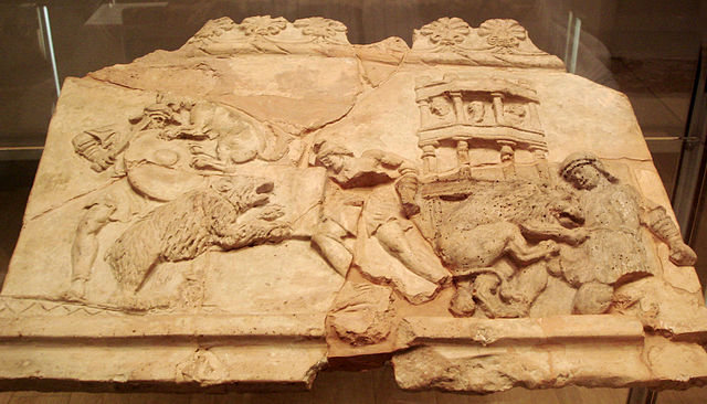Terracotta plaque (1st century) depicting a venatio, or human-animal blood sport