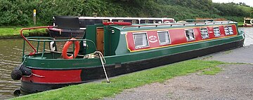 An example of what a boat used as a CCer may look like when moored. Mooring a CCer is the act of securing a mooring line (rope) between the boat and the bank, so the boat does not move away. Narrowboats-at-tardebigge.jpg