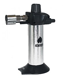 A small butane torch made for kitchen use Newport-zero-mini-butane-torch-lighter-silver.jpg