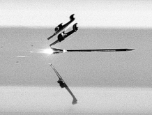 A sub-caliber armour-piercing fin-stabilized discarding sabot projectile in its sabot.