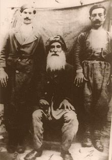 Seyid Riza with his sons.jpg