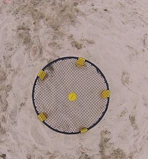 Roundnet Ball sport with racket and net