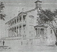 Photo of an early building on the Straight University campus StraightUMain.jpg