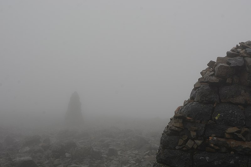 File:Summit cairn on Ben Nevis in thick fog.jpg