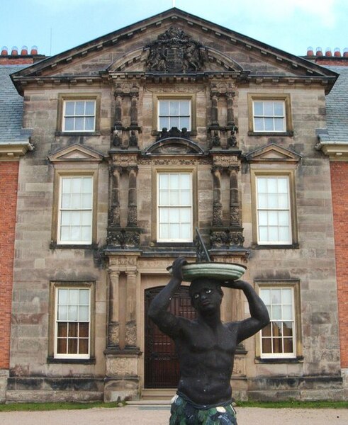 File:Sundial- statue at entrance to Dunham Massey Hall - geograph.org.uk - 1378663.jpg