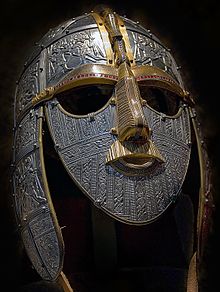 Replica of the 7th-century Sutton Hoo helmet. Besides use as armor, helmets had ceremonial function similar to crowns. Sutton Hoo helmet reconstructed.jpg