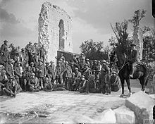 Men of the 7th (Service) Battalion, Suffolk Regiment, in the ruins of the church in Tilloy, France, 18 October 1917. The British Army on the Western Front, 1914-1918 Q6097.jpg