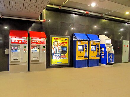 Different generations of ZTM ticket machines next to an ATM