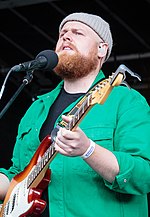 Glasgow-born singer-songwriter Tom Walker reached number-one in March with his debut album What a Time to Be Alive, which spent a total of 14 non-consecutive weeks in the UK top 10. Tom Walker Piknik i Parken 2018 (181841) (cropped).jpg
