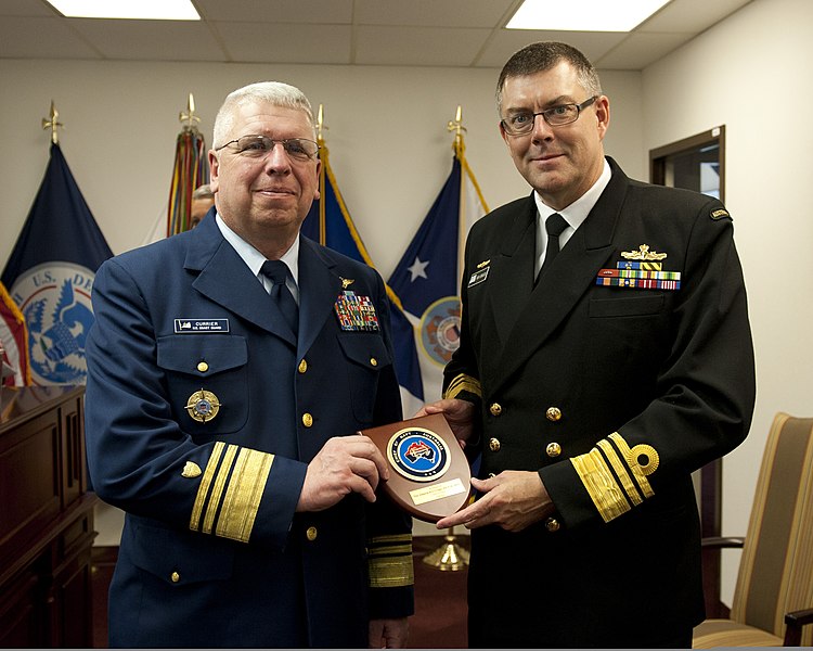 File:U.S. Coast Guard Vice Adm. John P. Currier, left, vice commandant of the Coast Guard, presents a gift to Australian navy Vice Adm. Raymond J. Griggs, right, during a meeting at Coast Guard Headquarters 130410-G-VS714-013.jpg