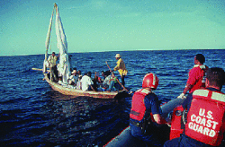 Haitian refugees intercepted by US Coast Guard in 1998. U.S. Coast Guard intercepting Haitian refugees.GIF