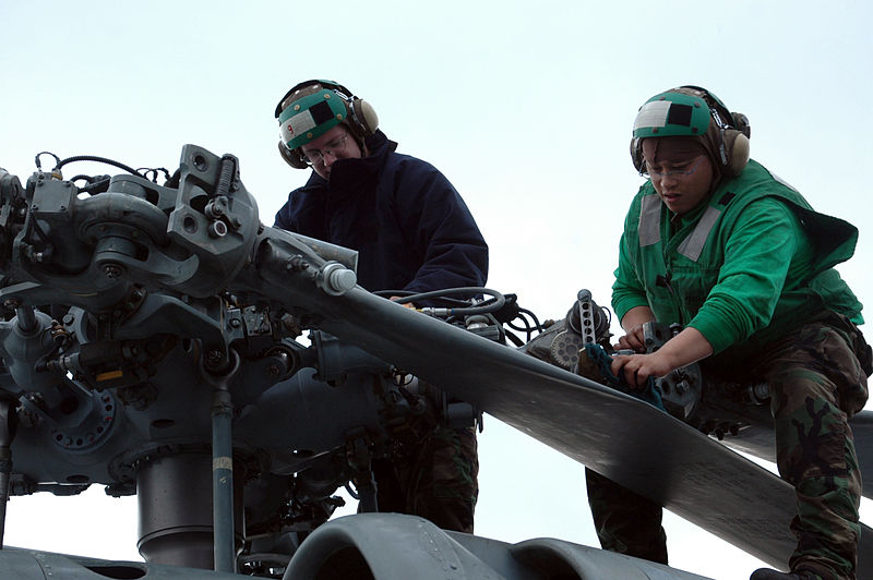 File:US Navy 051107-N-4321F-066 Aviation Machinist's Mates assigned to Helicopter Anti-Submarine Squadron Light Five One (HSL-51), perform a corrosion prevention inspection.jpg