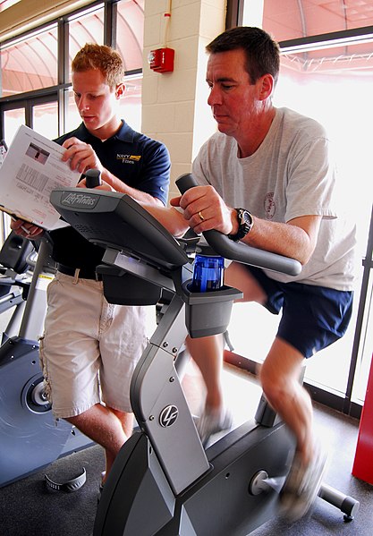 File:US Navy 090205-N-2183K-027 Cmdr. Robert Chase performs a cardio-vascular workout under the supervision of his advisor Rusty Early at Admiral Prout Field House.jpg