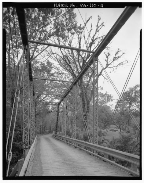 File:VIEW, WEST PORTAL, FROM SOUTHEAST, SHOWING UPPER CHORDS, VERTICALS, WEST PORTAL INCLINED ENDPOSTS AND STRUT, LATERAL STRUT AND BRACING, TIMBER DECK, AND RAILING - Virginia HAER VA,20-CLARK.V,1-11.tif