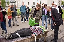 Demonstration of waterboarding at a street protest during a visit by Condoleezza Rice to Iceland, May 2008 Waterboarding.jpg