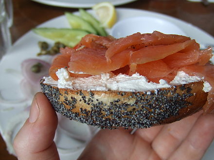 A "lox and a schmear" refers to a bagel and cream cheese with lox. This dish is a part of American Jewish cuisine.