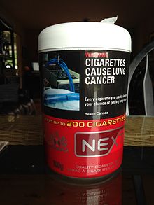 A 100 gram can of Next cigarette tobacco, purchased at a gas station in Nova Scotia, Canada. 100g Can of Next Tobacco.JPG