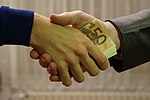 10 - hands shaking with euro bank notes inside handshake - royalty free, without copyright, public domain photo image 01.JPG
