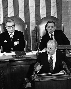 President Gerald Ford with Vice President Nelson Rockefeller and House Speaker Carl Albert during the 1975 State of the Union address. 1975 State of the Union Address.jpg