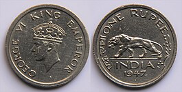 Rupia de 1947 com George VI no anverso e tigre-de-bengala, ano e país no reverso