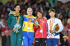 2016 Paralympics judo 57 kg women podium.jpg