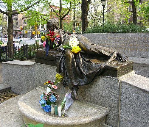 Flowers and candles adorn the Isidor and Ida Straus Memorial on April 15, 2012, the 100th anniversary of the sinking of the Titanic.