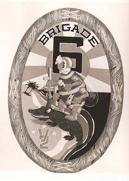 6th Naval Construction Brigade insignia incorporating the Alligator and 3 stars of V Amphibious Corps.