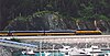 Alaska Railroad train passing Whittier harbor