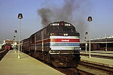 Amtrak 712 with a Peninsula Commute train, October 1978.jpg