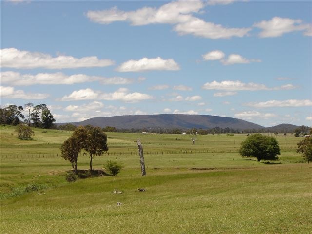 View of Mount Duval with farms in the foreground