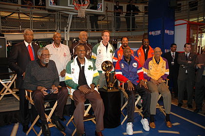Erving (top left) with other former NBA players visit the New York NBA Store in January 2005