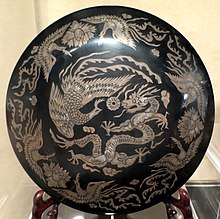 An example of Asian lacquerware: a 20th-century Chinese lacquer box Black lacquer box from China, lacquer on wood with silver, 20th century, East-West Center.JPG