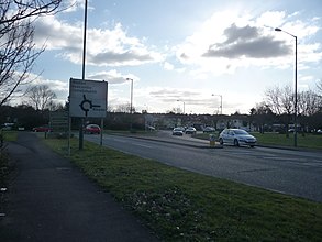 Northbourne Roundabout; at the boundary of Bournemouth (see the welcome sign on the left). The A347 road crosses this roundabout southbound. The road to the right of the roundabout is Wimborne Road, and is the eastern end of the A341 road. Bournemouth , New Road and Northbourne Roundabout - geograph.org.uk - 1704253.jpg