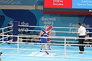 Deutsch: Boxen bei den Olympischen Jugendspielen 2018 Tag 12, 18. Oktober 2018 - Kampf um die Bronzemedaille im Fliegengewicht Mädchen – Heaven Destiny Garcia (USA, blau) schlägt Goryanana Stoeva (Bulgarien, rot) 5-0; Ringrichter ist Ishanguly Meretnyyazov (Turkmenistan). English: Boxing at the 2018 Summer Youth Olympics on 18 October 2018 – Girl's flyweight Bronze Medal Bout - Heaven Destiny Garcia (USA, blue) beats Goryanana Stoeva (Bulgaria, red) 5-0; Referee is Ishanguly Meretnyyazov (Turkmenistan). Español: Boxeo en los Juegos Olímpicos Juveniles de Verano de 2018 en 18 de octubre de 2018 - Combate a medalla de bronce de peso mosca para mujeres: Heaven Destiny Garcia (Estados Unidos, azul) le gana a Goryanana Stoeva (Bulgaria, roja) 5-0; El árbitro es Ishanguly Meretnyyazov (Turkmenistán).