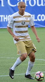 Luke Spencer was the first Xavier player to be drafted; he was picked 23rd in the 2013 MLS SuperDraft by the New England Revolution. CINvLOU 2017-05-31 - Luke Spencer (34669424420) (cropped).jpg